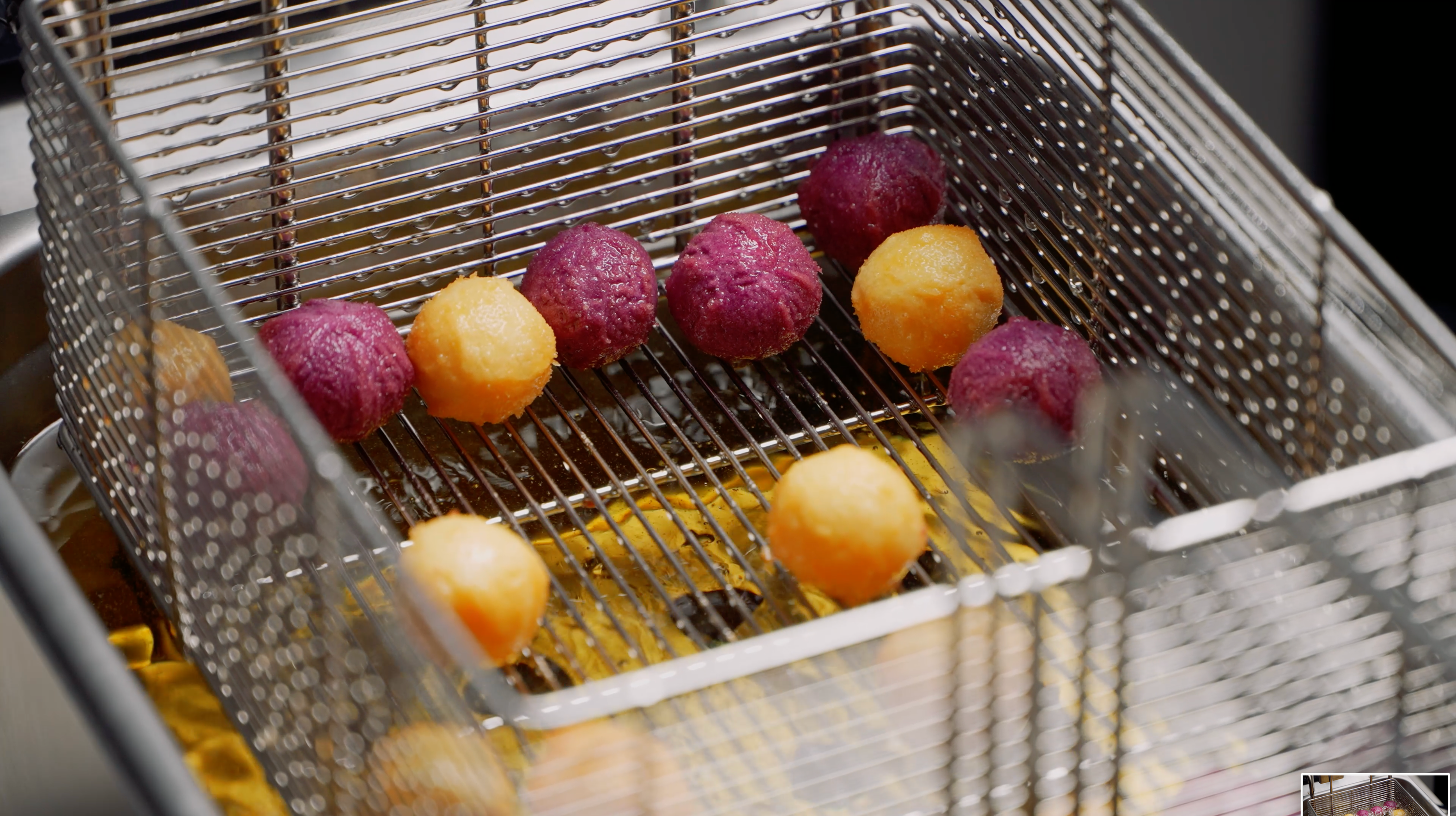 Lumo deep fryer crispy sweet potato balls drained from hot oil